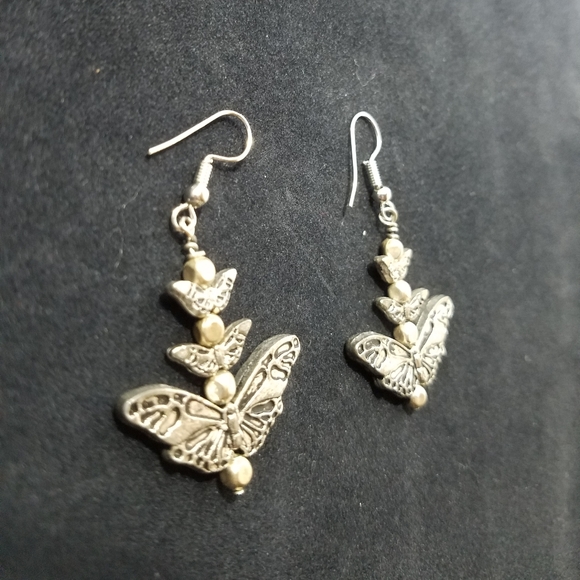 Whimsical Silver-Toned Butterfly Charm Dangling Handcrafted Earrings - Picture 5 of 6